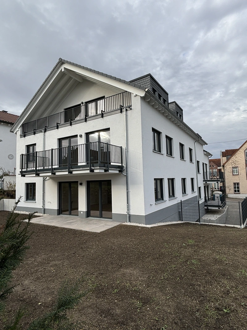 Das realisierte Wohnhaus von der Gartenseite